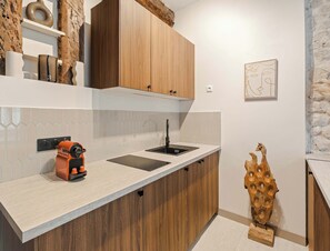 Microwave, stovetop, coffee/tea maker, toaster