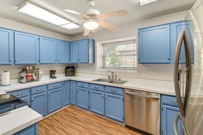 Dishwasher, coffee/tea maker, cookware/dishes/utensils, dining tables