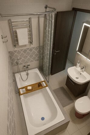 Luxury Suite, Balcony | Bathroom | Towels, soap, shampoo