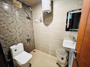 Shower, towels, soap, toilet paper