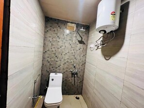 Shower, towels, soap, toilet paper