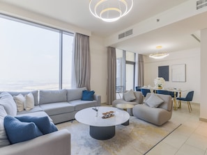 Luxury Apartment, Balcony, Bay View | Living area