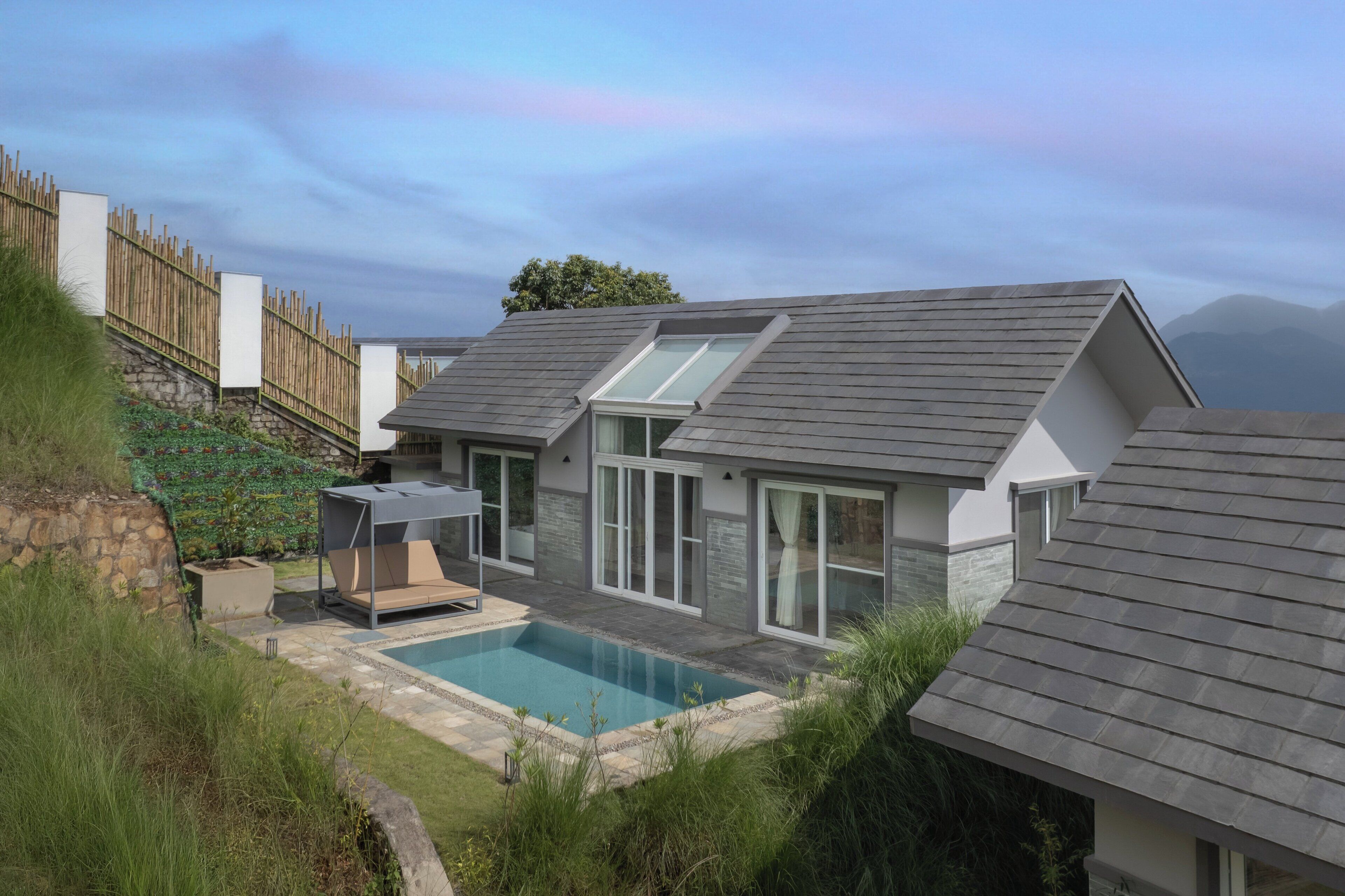 Villa (Pool) | Minibar, individually decorated, individually furnished, desk