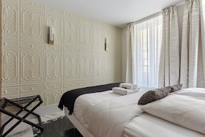 مكواة/لوح كي وملاءات أسرّة