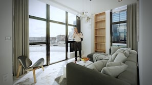 Suíte júnior | Área de estar | Smart TV 50 polegadas com canais digitais