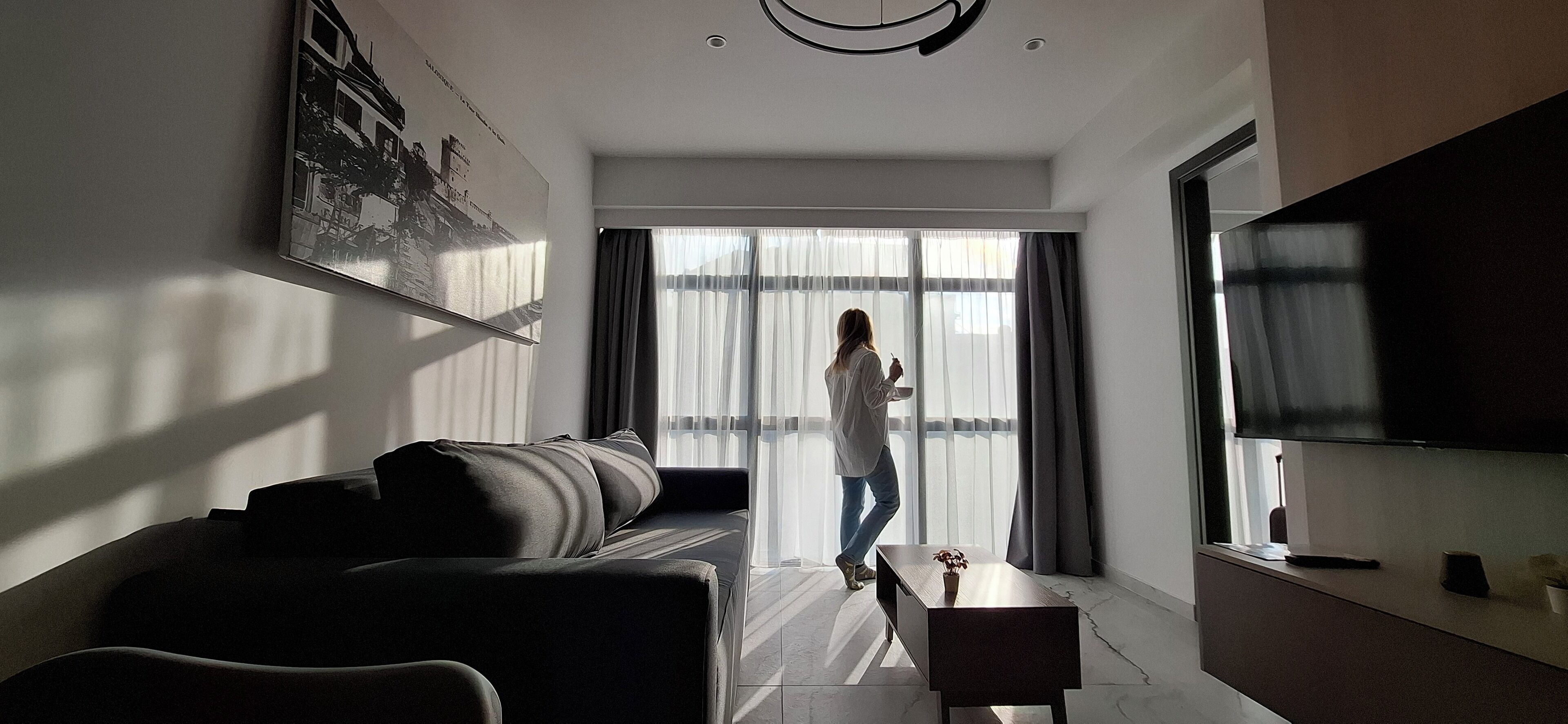 Deluxe Apartment | Living area | 50-inch Smart TV with digital channels