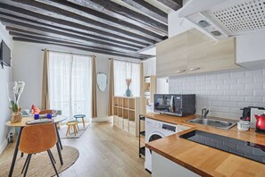 Fridge, microwave, stovetop, coffee/tea maker