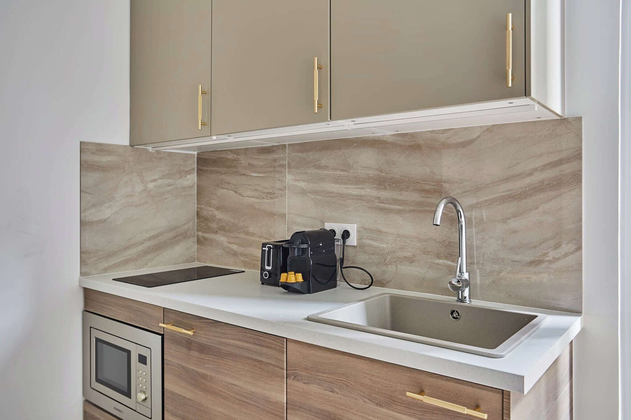 Fridge, microwave, stovetop, coffee/tea maker