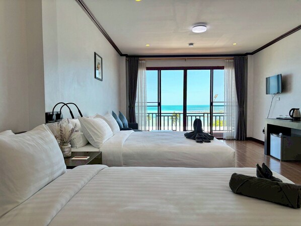 Triple Room, Balcony, Sea View | Minibar, desk, blackout curtains, free WiFi