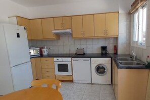 Private kitchen - Ground Floor 2-bedroom apartment in delightful Polis Chrysochous with AC (Polis Crysochous)