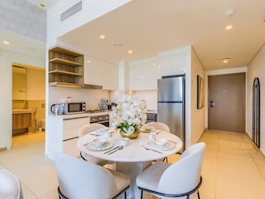Luxury Apartment, Balcony, City View | In-room dining