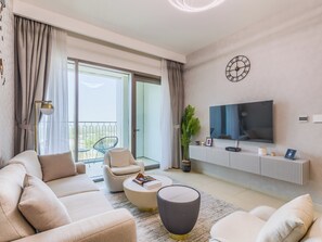 Luxury Apartment, Balcony, City View | Living area | 55-inch Smart TV with digital channels