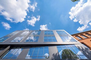 A modern building with large windows and a clear blue sky. - West Baltic City (Szczecin)