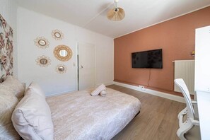 2 dormitorios, tabla de planchar con plancha, wifi y ropa de cama