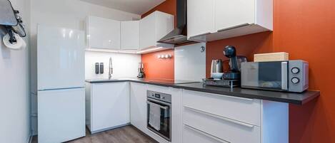 Fridge, microwave, oven, high chair