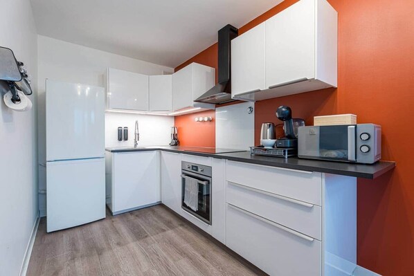 Fridge, microwave, oven, high chair