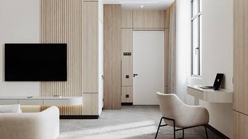 Suite estudio Grand, en la zona del patio | Ropa de cama hipoalergénica, minibar, caja fuerte y escritorio