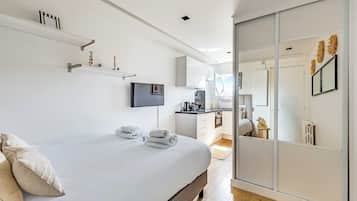 House | Laptop workspace, iron/ironing board, bed sheets