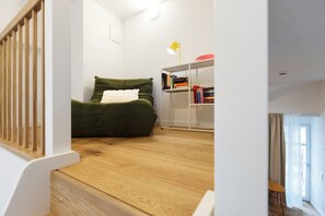 Comfort Studio, Balcony, Courtyard View | Living area | 55-inch Smart TV with digital channels