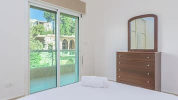 Apartment, 3 Bedrooms, Kitchen, City View | Blackout drapes, iron/ironing board, free WiFi