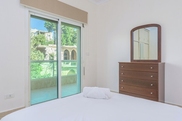 Apartment, 3 Bedrooms, Kitchen, City View | Blackout drapes, iron/ironing board, free WiFi