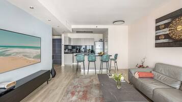 Appartement, uitzicht op zee | Woonruimte