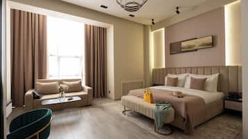 Habitación Deluxe doble, vistas al patio | Ropa de cama de alta calidad, minibar, caja fuerte y escritorio