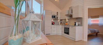 Baltic Sea vacation home Marielund with garden and children's play tower in Holm vacation park