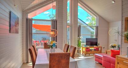 Baltic Sea vacation home Marielund with garden and children's play tower in Holm vacation park