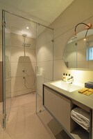 Shower, slippers, towels, soap