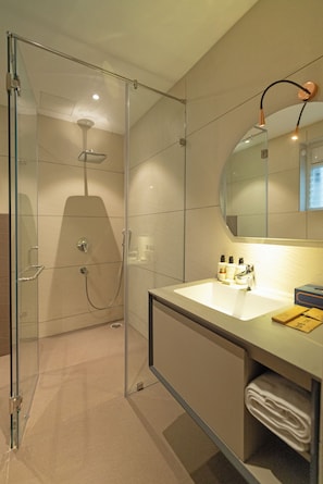 Shower, slippers, towels, soap