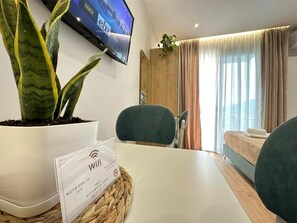 Apartamento clássico | Área de estar | Smart TV