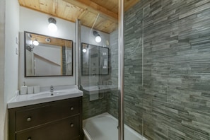 Shower, free toiletries, hair dryer, towels