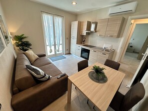 Comfort Apartment, Balcony | Living area | Computer monitors