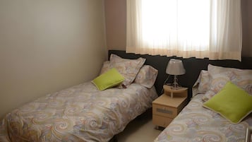 2 dormitorios y ropa de cama