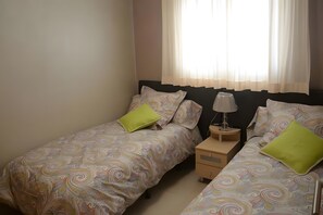 2 dormitorios y ropa de cama