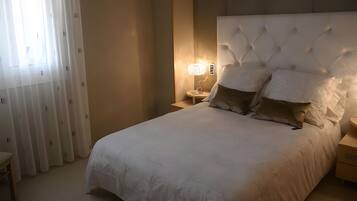 2 habitaciones y ropa de cama