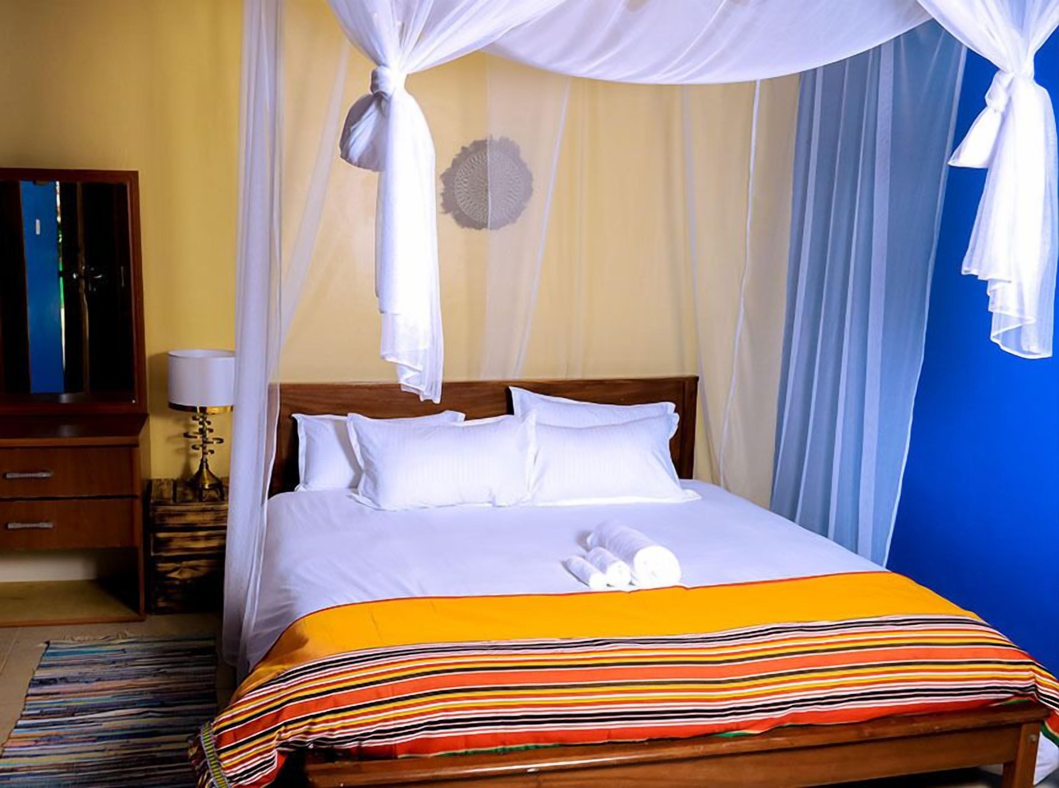 Deluxe Double Room, Garden View | Desk, laptop workspace, iron/ironing board, free WiFi