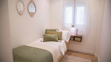 2 dormitorios, tabla de planchar con plancha, wifi gratis y ropa de cama