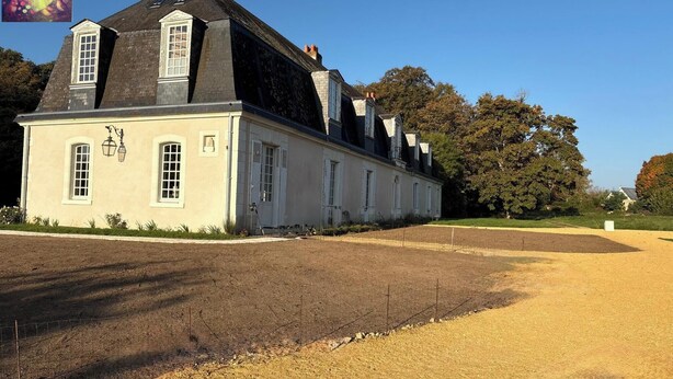A large, historic building with multiple chimneys and a prominent tower. - Nature immersion just 3 minutes from Tours (Mettray)