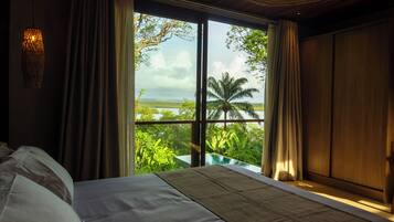 Suíte executiva, vista para o mar | Cofres nos quartos, cortinas blackout, Wi-Fi de cortesia