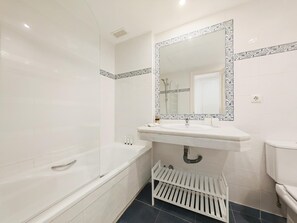 Hair dryer, bidet, towels, soap