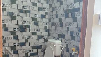 Shower, rainfall showerhead, towels, soap