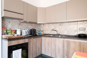Fridge, microwave, coffee/tea maker, electric kettle