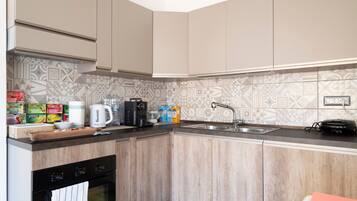 Fridge, microwave, coffee/tea maker, electric kettle