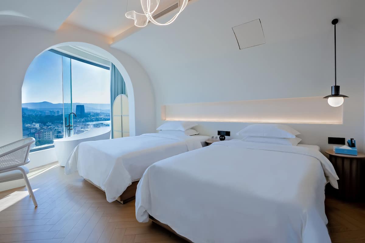 Basic Double Room, 2 Single Beds, Private Bathroom, City View | Blackout curtains, soundproofing, free WiFi