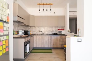 Fridge, microwave, coffee/tea maker, electric kettle