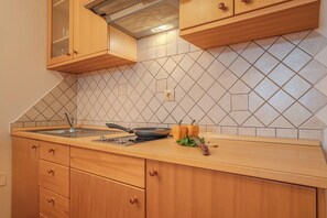 Family Studio (Oblak Estate Studio Lana) | Shared kitchen | Fridge, stovetop, cookware/dishes/utensils, freezer