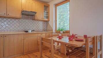 Family Apartment, 1 Bedroom (Oblak Estate Apartment Natasa) | Shared kitchen | Fridge, stovetop, cookware/dishes/utensils, freezer