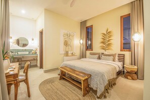 A bedroom with a bed, bedside table, lamp, and a window with curtains. - Chic Villa Living, Hidden in the Calm of Tumbak Bayuh (Canggu)